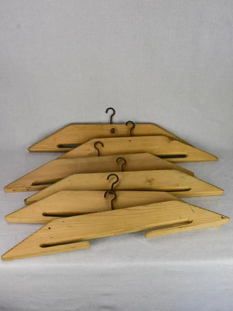 Collection of 6 Monk's coat hangers from the early 20th century